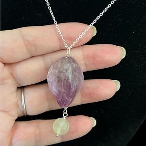 Large Carved amethyst pendant  set in silver plus matching necklace